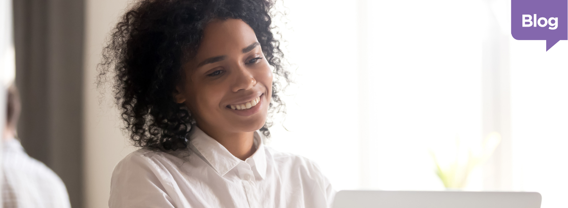 Employee smiling at employee benefit package