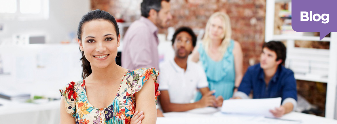 Business owner smiling in front of Outsourced HR partners