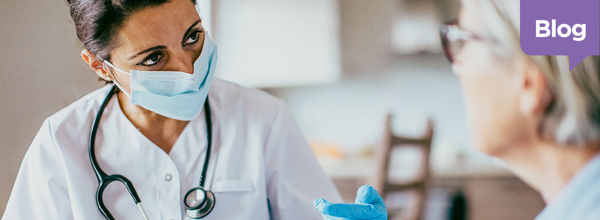 Doctor testing a worksite employee for COVID-19