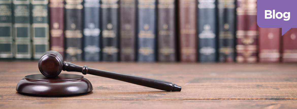 Gavel on Desk with Labor Law books behind